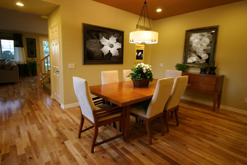 A Toms River dining room with floors refinished by Fabulous Floors.
