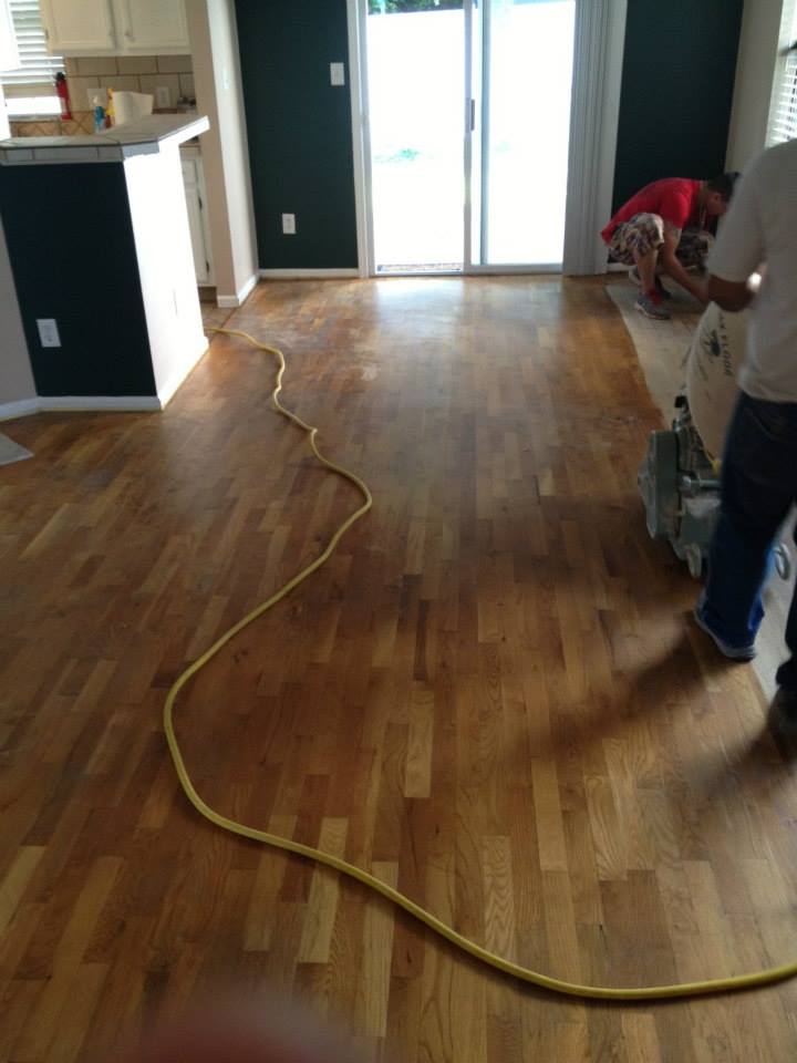 A hardwood floor that needs to be refinished