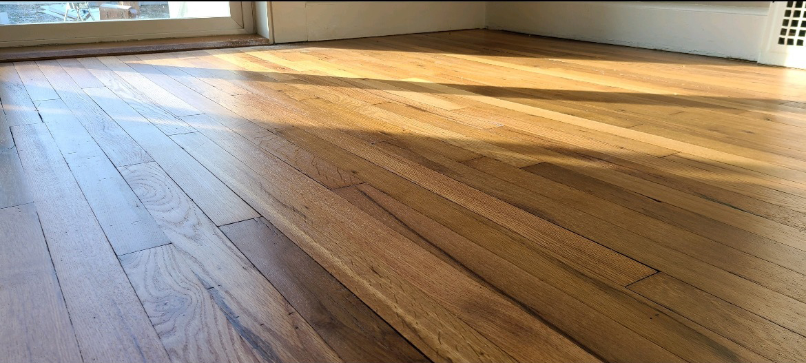 a refinished hardwood floor surface.